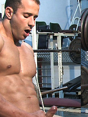 Two hot bodybuilders jerking together after training
