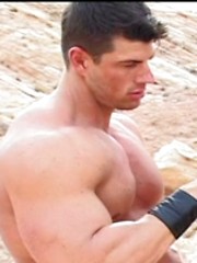 Two strong bodybuilders relaxin in the desert
