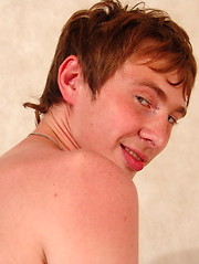 The redhaired boy is wanking a penis
