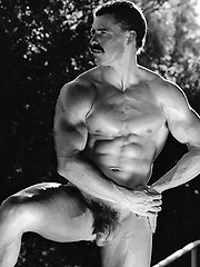 Daddy from 70s shows his muscled buddy