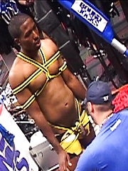 Bounded black guy gets public handjob from white gay