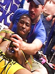 Bounded black guy gets public handjob from white gay